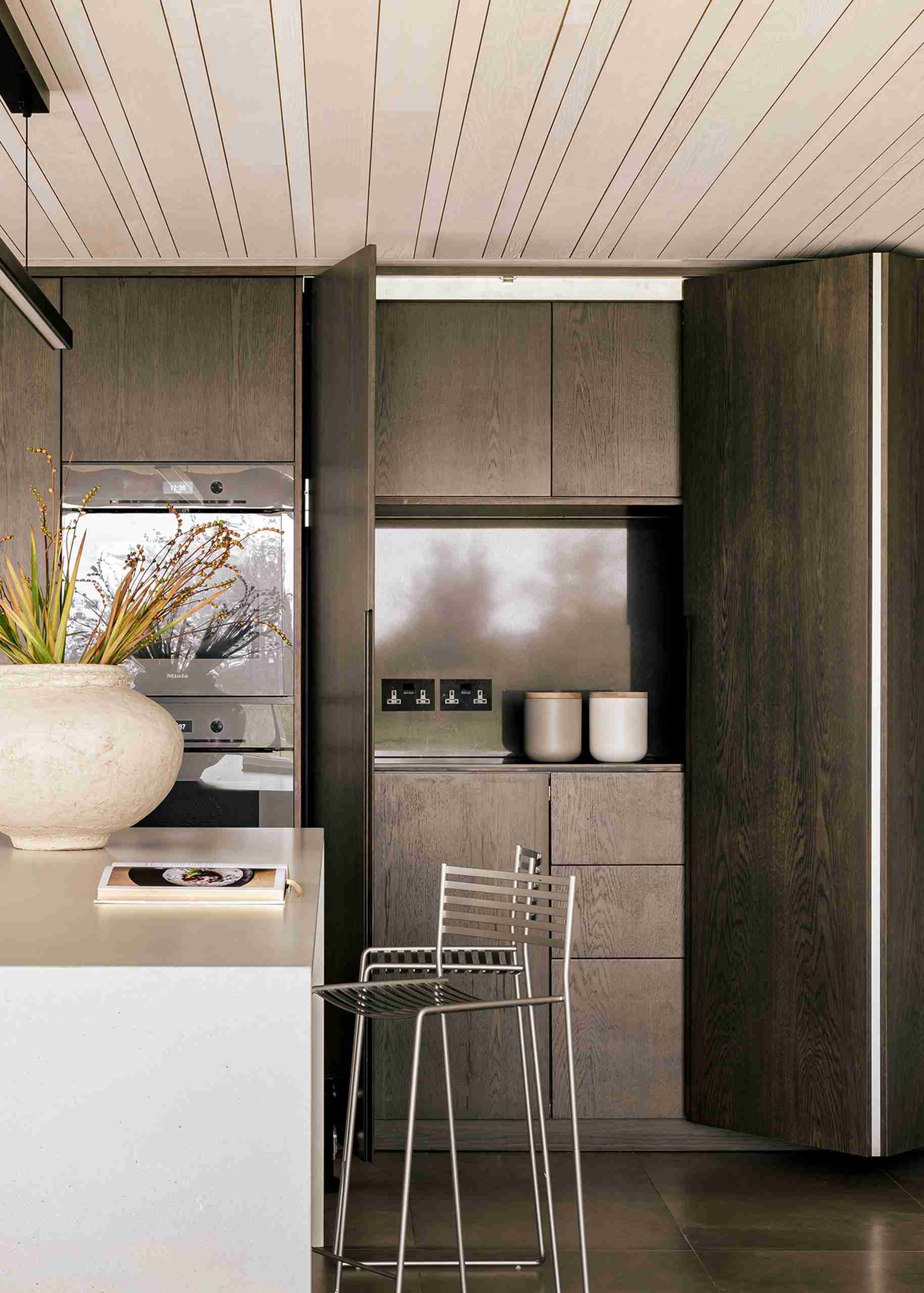 High end kitchen cabinetry featuring storage display.