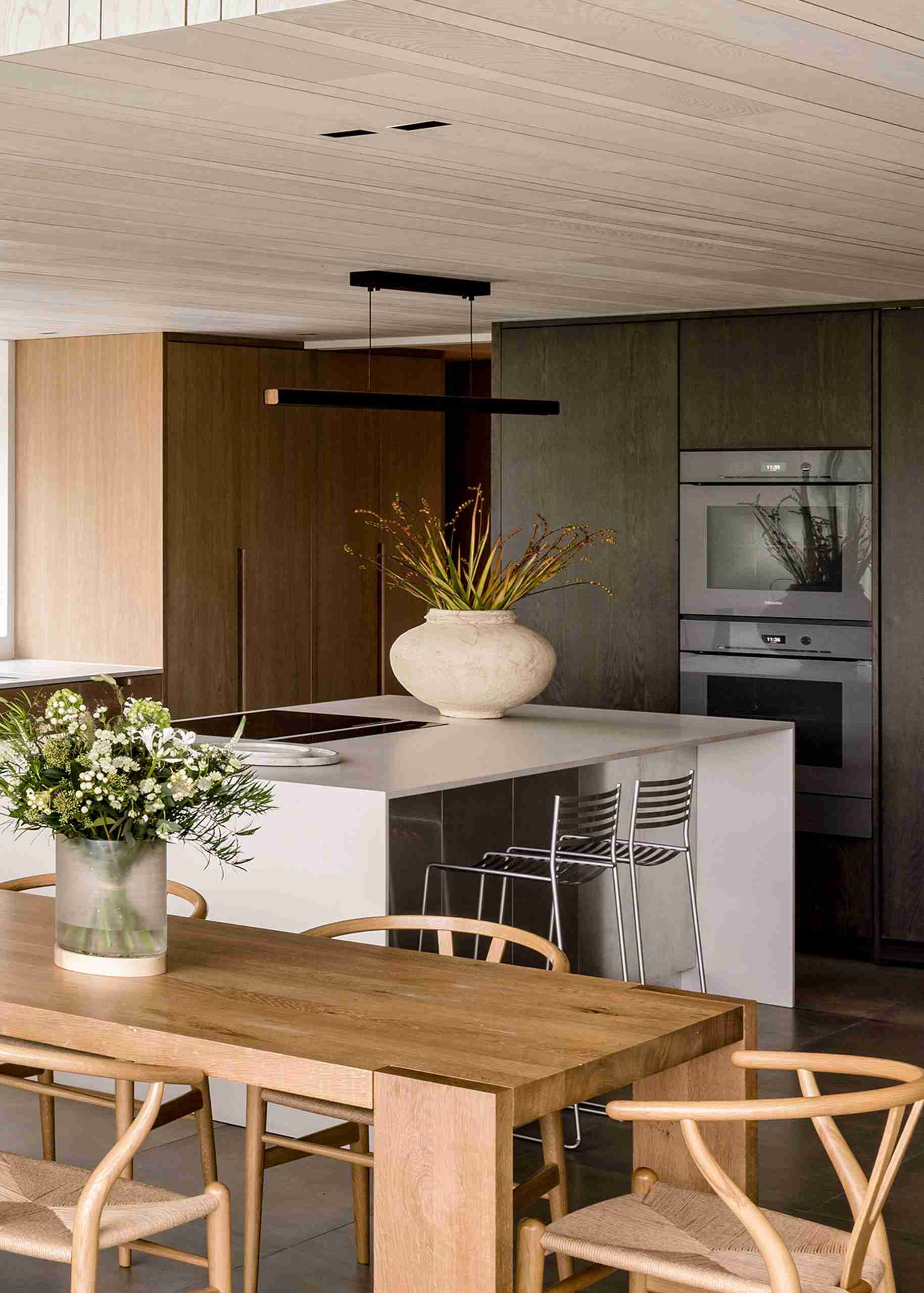 High end kitchen with metal clad island crafted by our joiners.