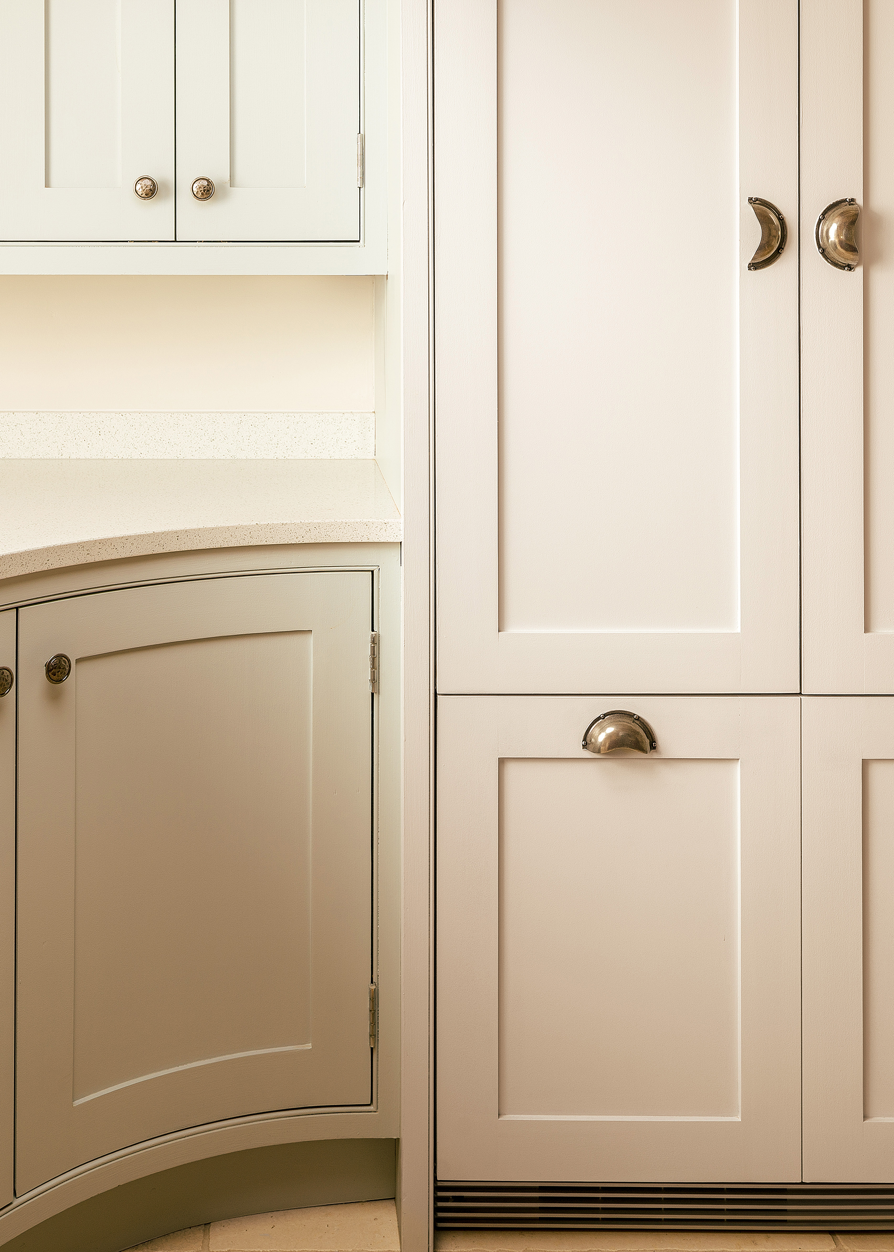 Sleek classic hand painted kitchen cabinetry created by our expert joiners.