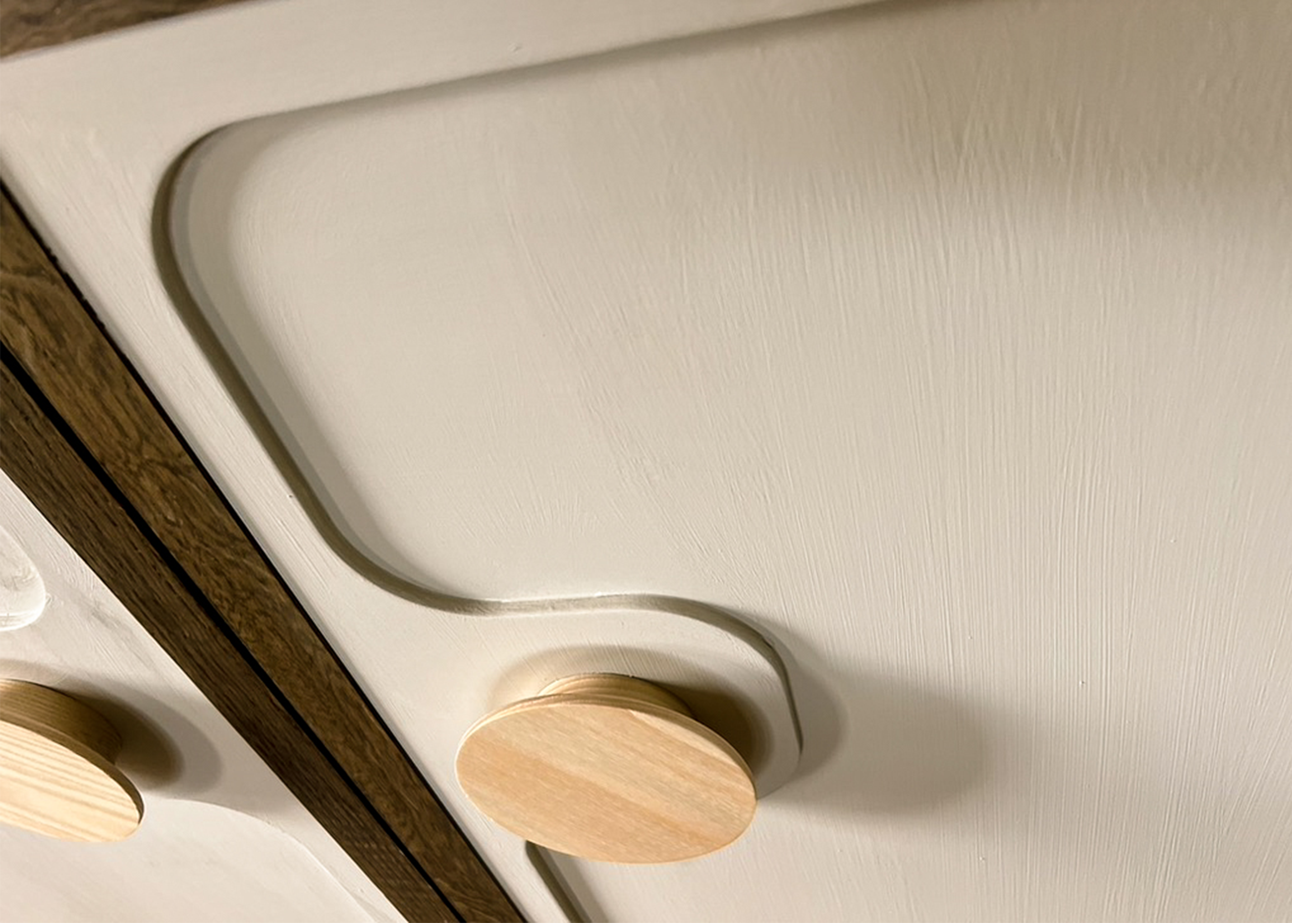 A close up image of cupboard doors of a radiator cover.