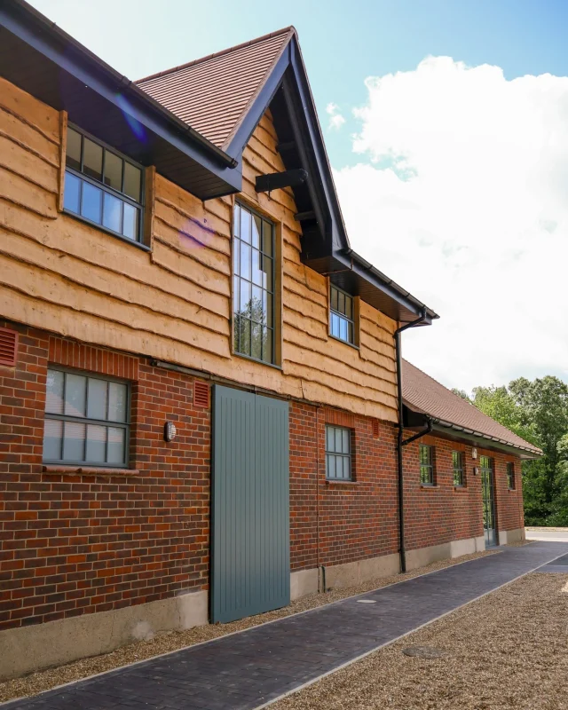 Set within a once abandoned dairy farm in Berkshire, we were proud to support @kingerlee_ltd on this restoration project.Our brief was to replicate an existing pair of doors that were beyond repair. Every detail and section size was carefully matched to ensure a seamless fit with the original design. The new doors were crafted from Accoya for durability and stability, then spray finished in our workshop to complement the existing windows and doors across the site.A great result all round, and a project we really enjoyed being a part of.